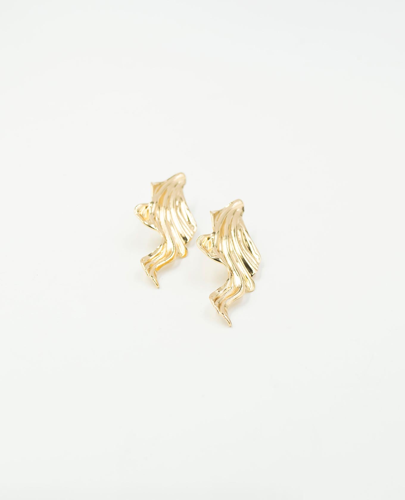 ARETE FEMENINO METÁLICO FORMA IRREGULAR Adrissa | Ropa para mujer