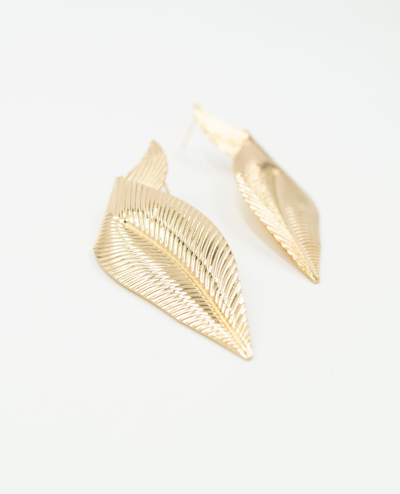 ARETE FEMENINO ALAS Adrissa | Ropa para mujer