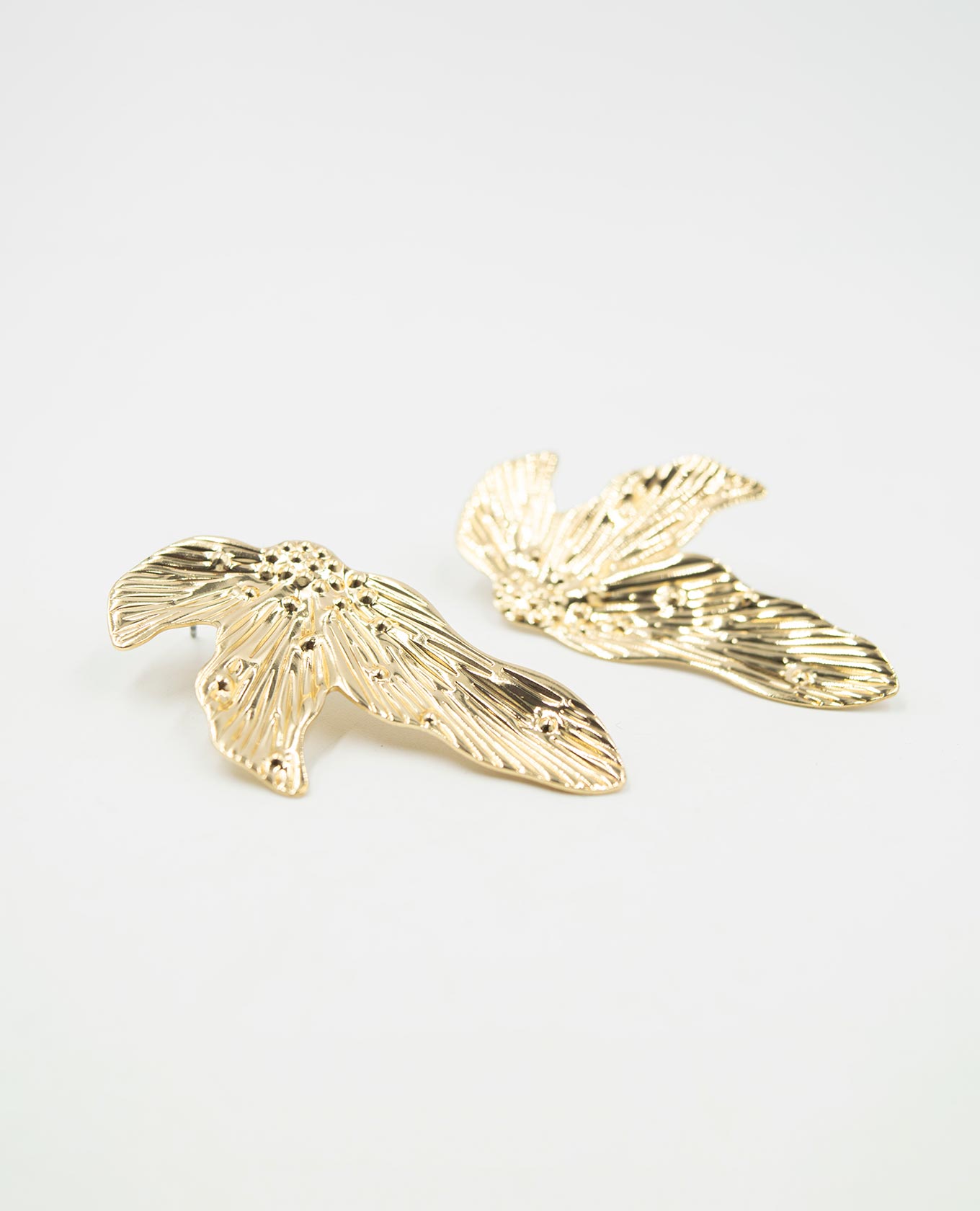 ARETE FEMENINO HOJA Adrissa | Ropa para mujer