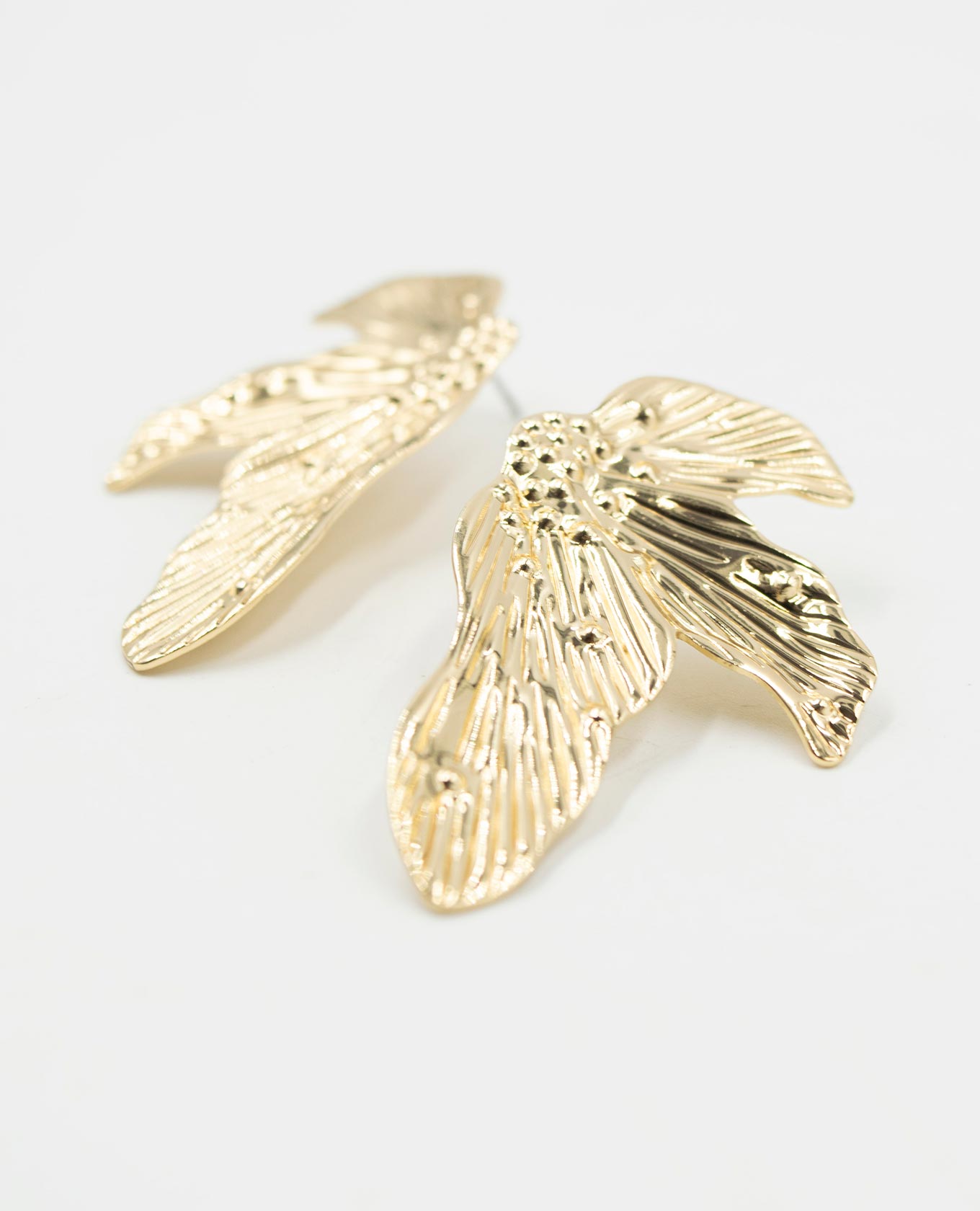 ARETE FEMENINO HOJA Adrissa | Ropa para mujer