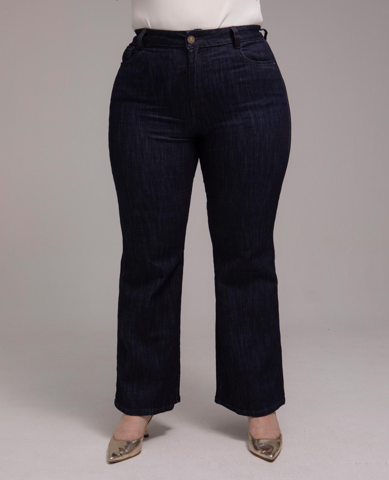 JEAN FLARE TALLAS GRANDES TONO OSCURO CON BOLSILLOS RIBETES Adrissa | Ropa para mujer