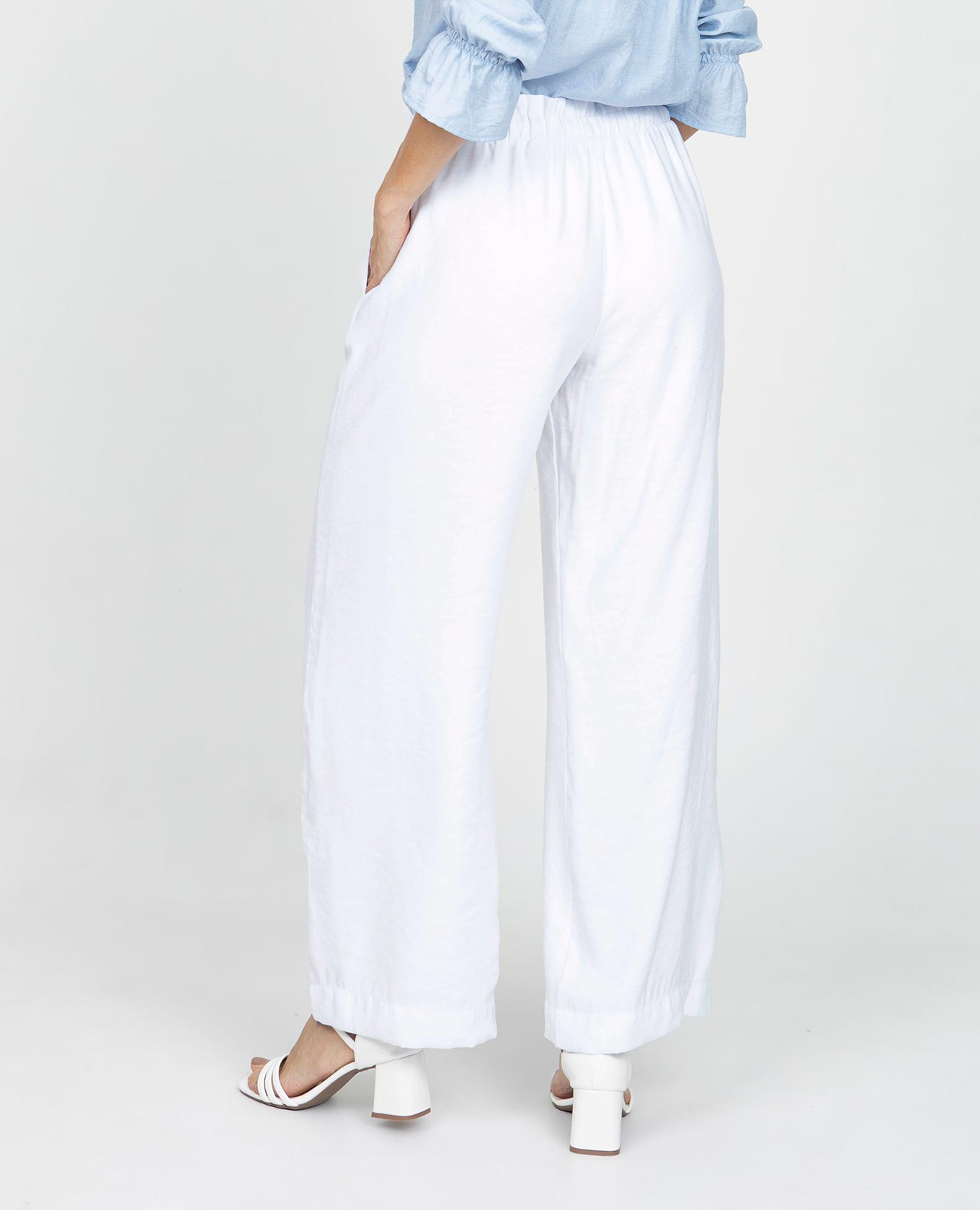 PANTALÓN BLANCO PARA MUJER SILUETA WIDE LEG CON ELASTICO EN CINTURA Y TIRAS Adrissa | Ropa para mujer Pantalones