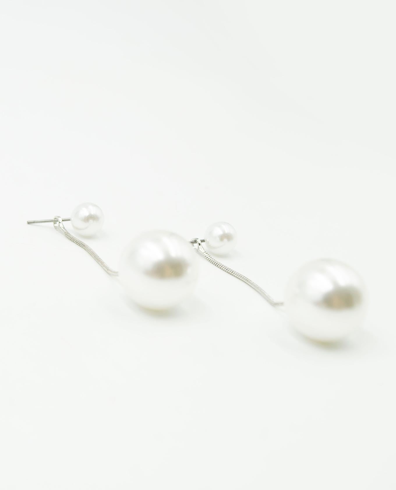 ARETE FEMENINO COLGANTE PERLAS Adrissa | Ropa para mujer